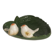 Ceramic leaf shaped bird bath with birds