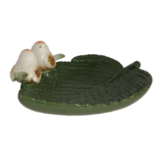 Ceramic leaf shaped bird bath with birds