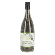 Bouteille de vin remplie de graines de tournesol noires