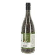 Bouteille de vin remplie de graines de tournesol noires