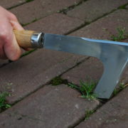 Stainless steel pavement cleaner